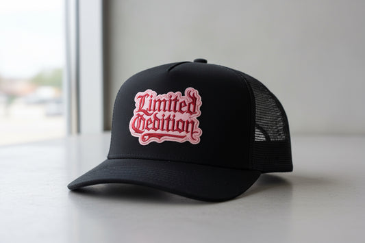 Embroidered 'Limited Edition' text on a textured white background